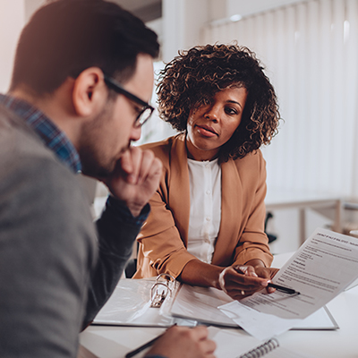 Management Consulting, people reviewing business papers.
