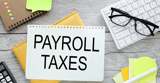 payroll taxes . text in the center of the template near the calculator and white calculators