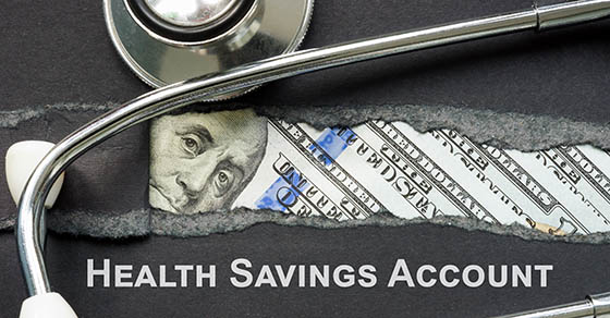 HSA health savings account sign and a stethoscope.